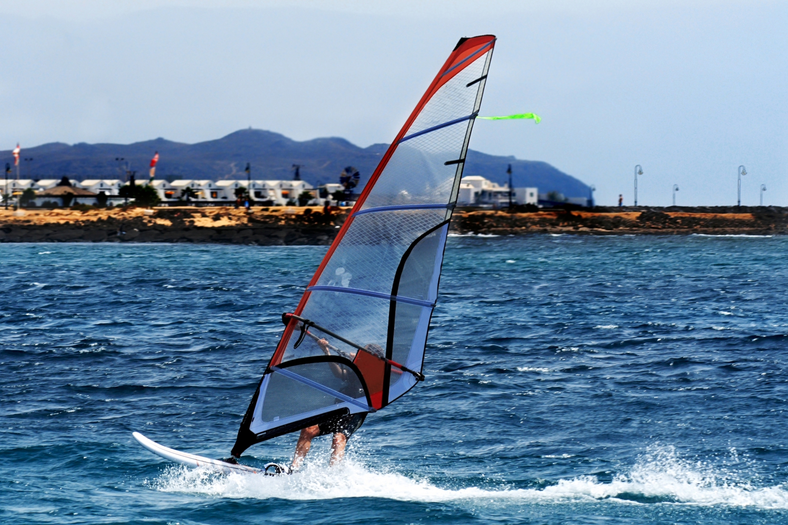 'A windsurfer sailing off the coast of Lanzarote' - Lanzarote